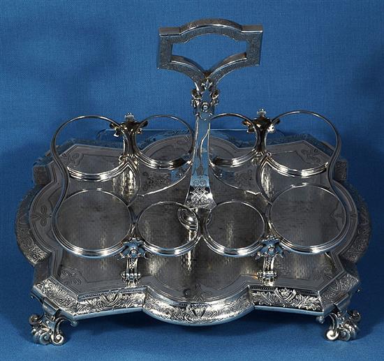 A Victorian silver eight bottle cruet stand and eight original bottles, by Walter & John Barnard, height 280mm, weight 40oz